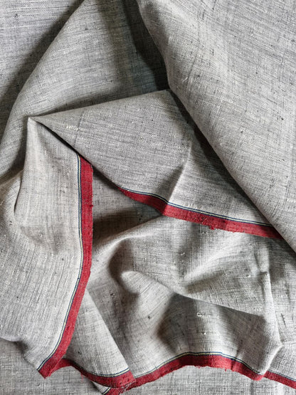 Gray fabric with red border