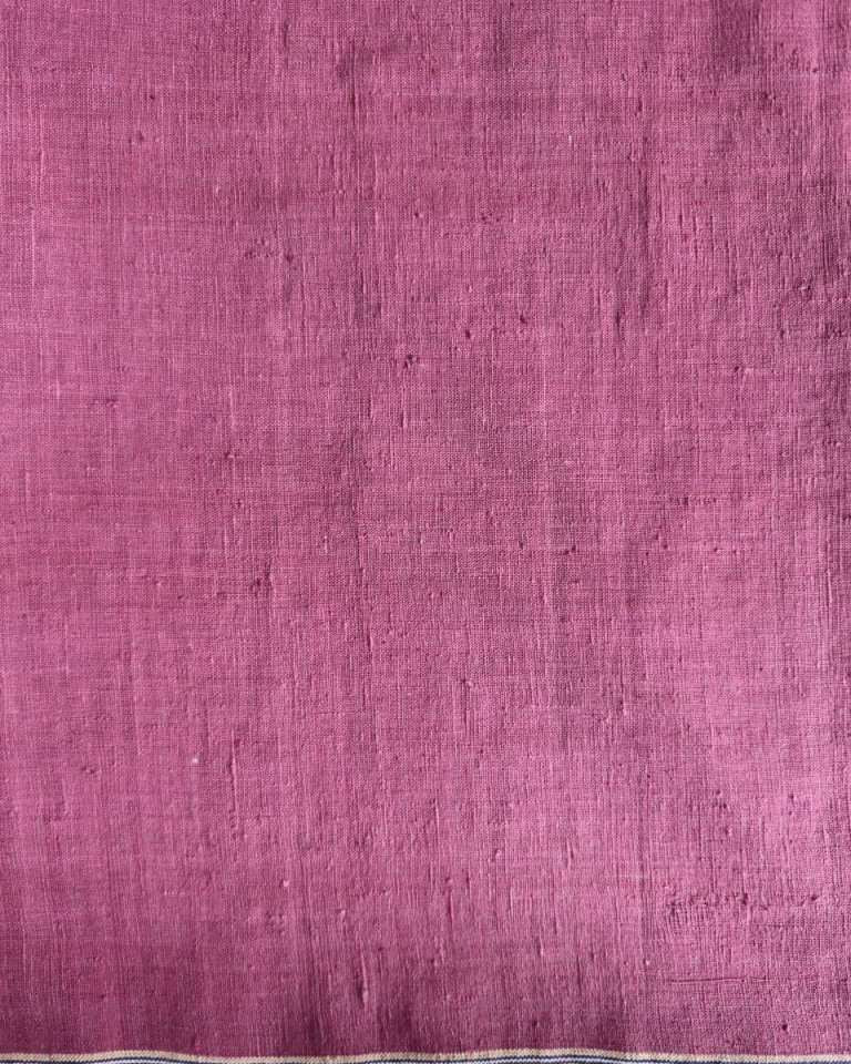 Textured purple fabric with a subtle pattern