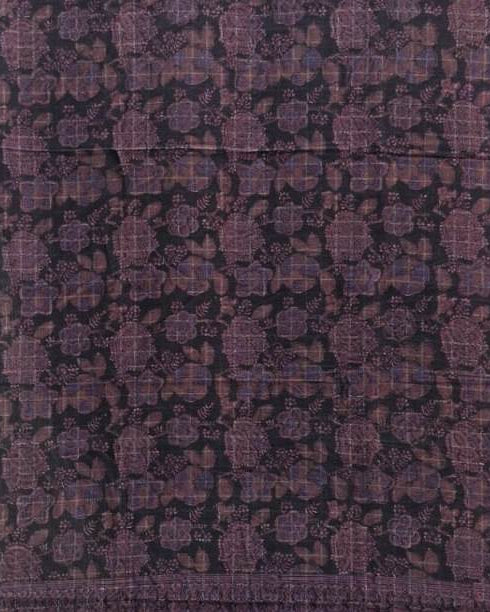 A square piece of dark purple and black patterned fabric with intricate floral and geometric motifs, finished with a decorative border.