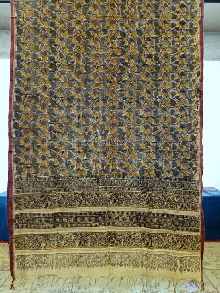 Decorative fabric with intricate patterns on a plain background