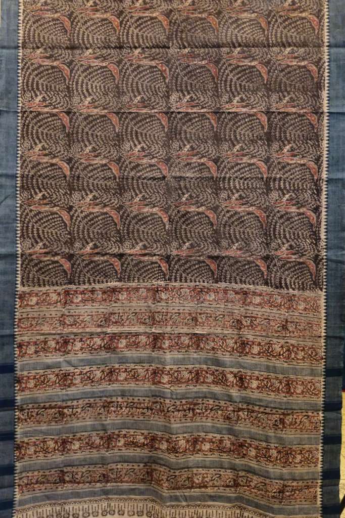 Textile with intricate pattern on a dark background