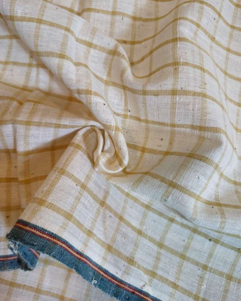 Close-up of checkered fabric with a visible zipper