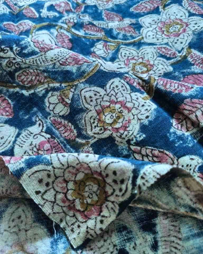 Floral patterned fabric with a blue background